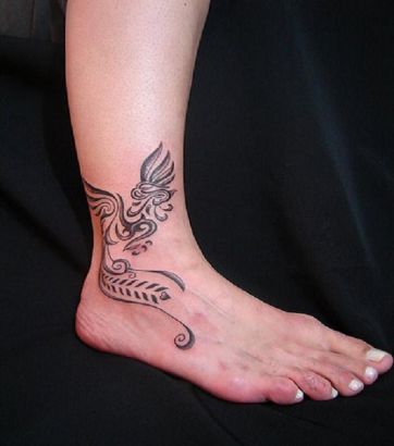 Tribal Pic Tattoo On Ankle